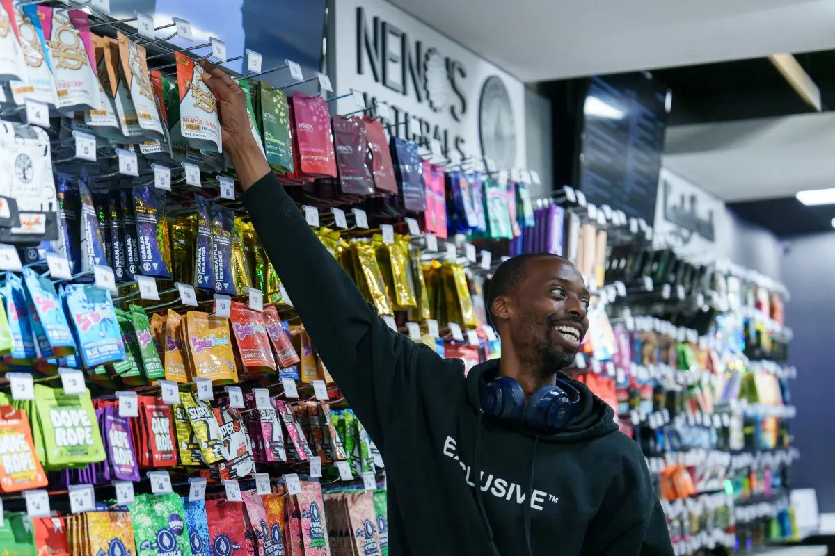 Active consumers searching for top marijuana dispensaries near me options inside a modern digital showroom.