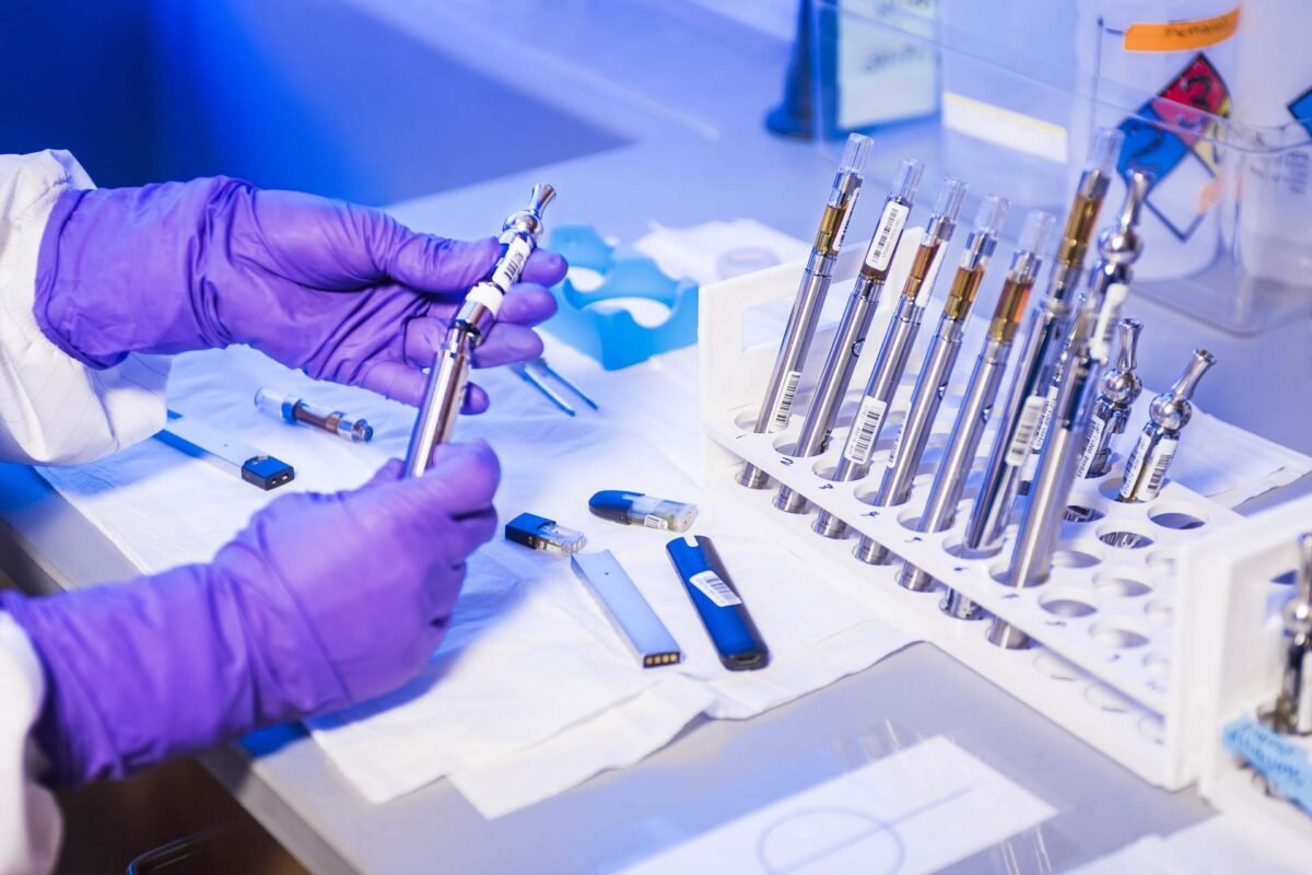 Premium vapes uk arranged neatly next to clean laboratory test results from Prime THC Supply