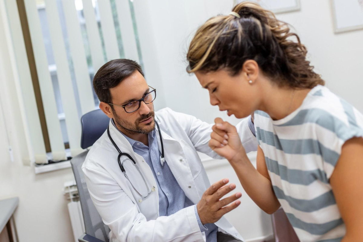 A doctor explaining what is codeine and explaining safety precautions to a patient in a medical office